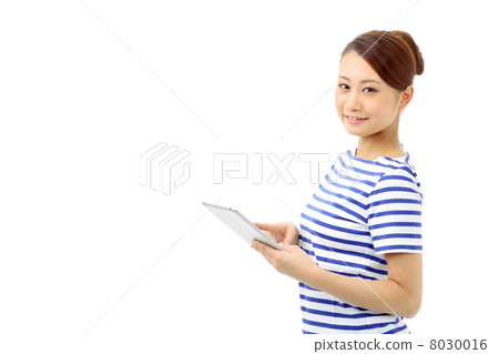 Girls using tablets Girls using tablets 8030016