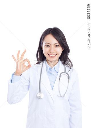 Female doctor signaling OK 8035169