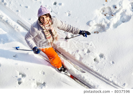 Woman on skis 8037596