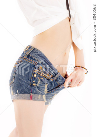 A young lady who shows a stomach with a short bowl that got thin and loose A young lady who shows a stomach with a short bowl that got thin and loose 8040568