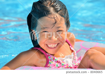 Girls laughing at the pool 8040665