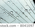 Dull sky and lots of raindrops 8041097
