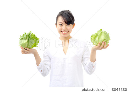 A woman with lettuce 8045880