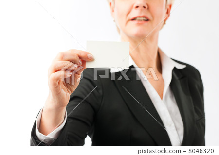 Mature woman showing her business card 8046320