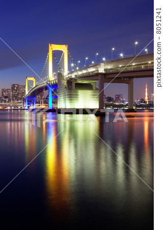 A rainbow bridge with a special light-up to a rainbow color and a scenery reflected on the sea surface A rainbow bridge with a special light-up to a rainbow color and a scenery reflected on the sea surface 8051241