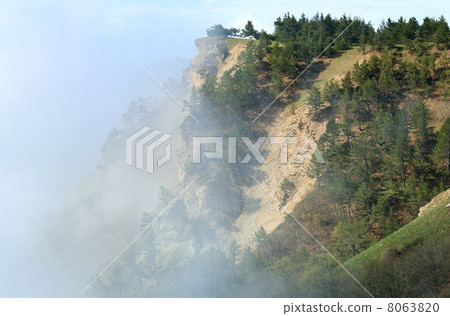 Cloudy mountain landscape 8063820