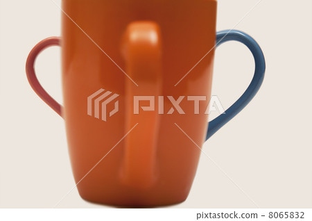 Close-up of an orange mug Close-up of an orange mug 8065832