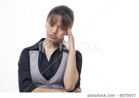 Worried young businesswoman over white background 8070057