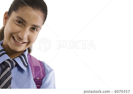 Portrait of a school girl smiling Portrait of a school girl smiling 8070357