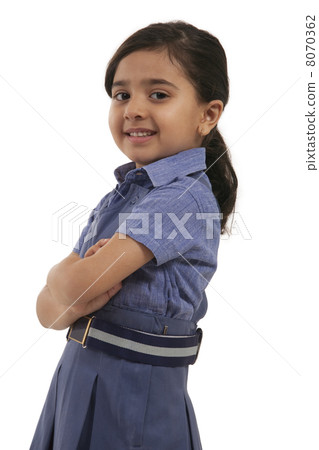 Portrait of a young school girl smiling Portrait of a young school girl smiling 8070362