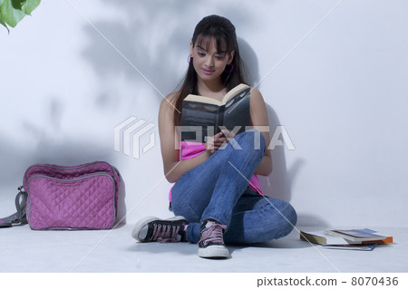 Girl reading a book Girl reading a book 8070436