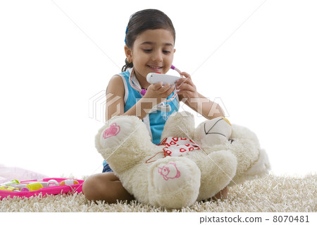 Girl with a toy thermometer Girl with a toy thermometer 8070481