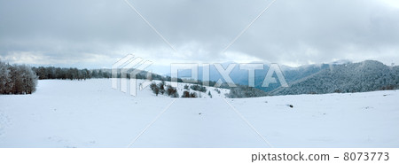 First winter snow and mountain panorama 8073773