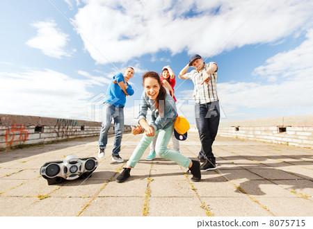 group of teenagers dancing 8075715