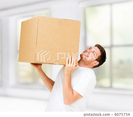 man carrying carton heavy box man carrying carton heavy box 8075734