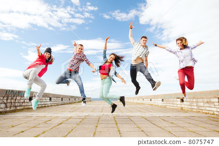 group of teenagers jumping group of teenagers jumping 8075747