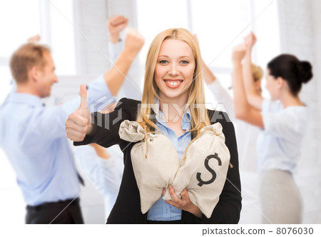 businesswoman with money bags showing thumbs up 8076030