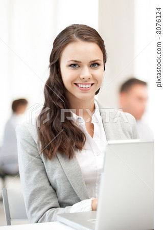 businesswoman with laptop computer at work businesswoman with laptop computer at work 8076124