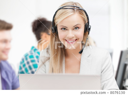 helpline operator with headphones in call centre helpline operator with headphones in call centre 8076130