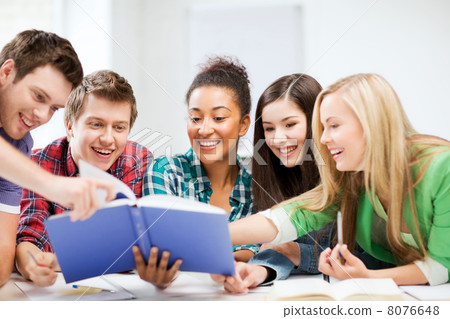 students reading book at school 8076648