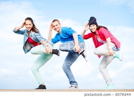 group of teenagers dancing group of teenagers dancing 8076844