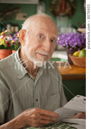 Senior man with important letter 8076935