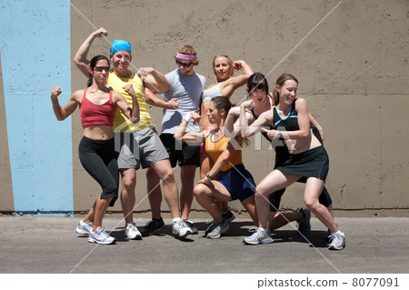 Runners pose for muscle shot 8077091