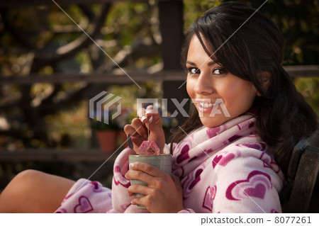 Pretty Hispanic Woman in Bathrobe with Tea Pretty Hispanic Woman in Bathrobe with Tea 8077261