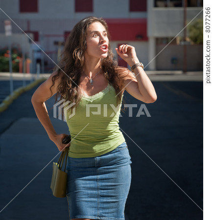 Beautiful, angry woman yells her frustrations. 8077266