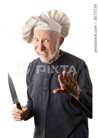 Funny senior chef with knife 8077339