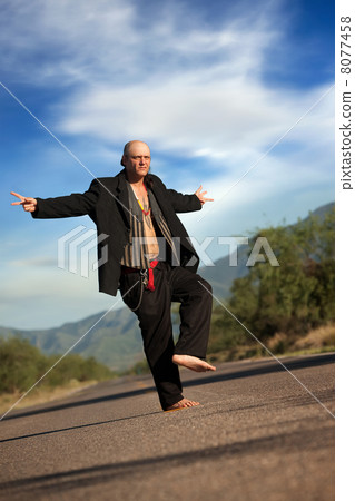 Indigenous man in the middle of a road Indigenous man in the middle of a road 8077458