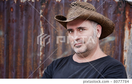 Man in Cowboy Hat Man in Cowboy Hat 8077784
