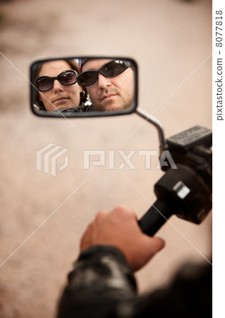 Motorcyclist and Woman Reflection Motorcyclist and Woman Reflection 8077818