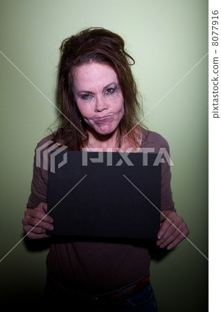 Frustrated woman taking mugshot 8077916