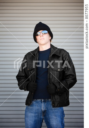 Young man in sunglasses 8077955