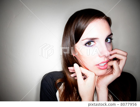 Apprehensive Young Woman 8077956