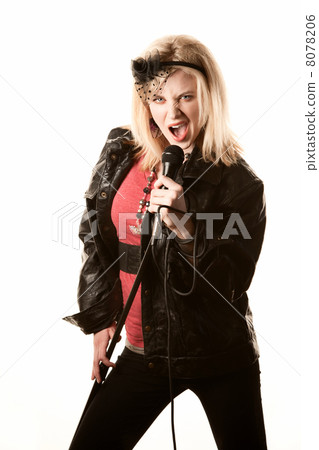 Pretty young singer or comedian with microphone 8078206