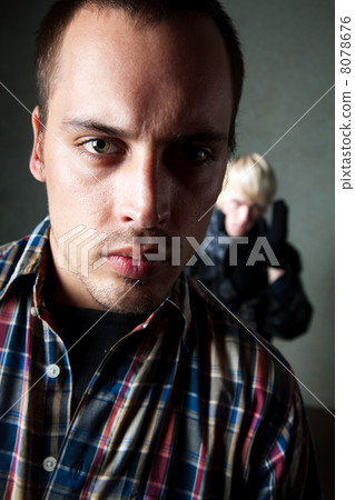 Man being stalked by criminal Man being stalked by criminal 8078676
