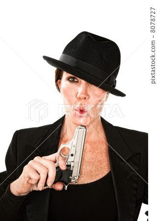 Woman blowing on the end of a smoking gun 8078727