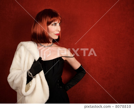 Socialite with brassy red hair Socialite with brassy red hair 8078810