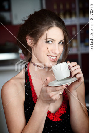 Pretty Young Woman Tasting Coffee 8078856