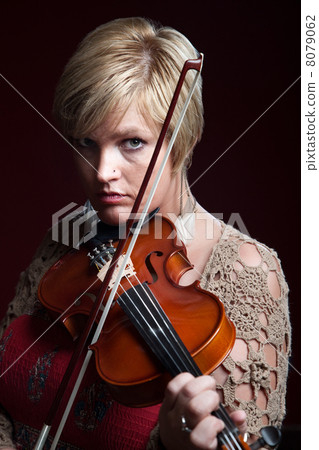Woman Plays a Violin Woman Plays a Violin 8079062