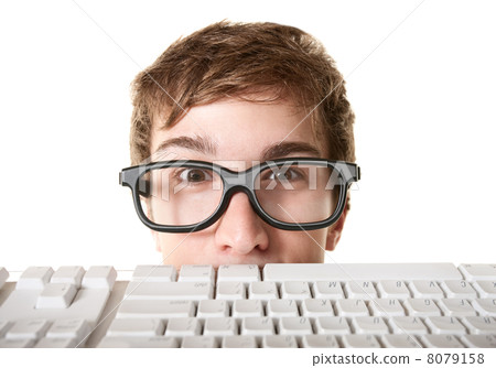 Teen Behind Computer Keyboard 8079158