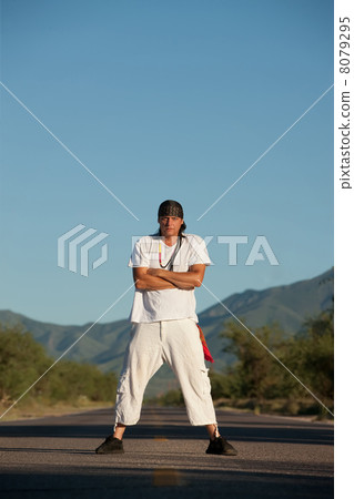 Man in the middle of a road Man in the middle of a road 8079295