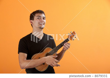 Teen Playing Ukulele 8079331