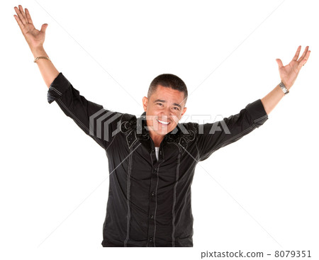 Happy latino man with raised arms 8079351