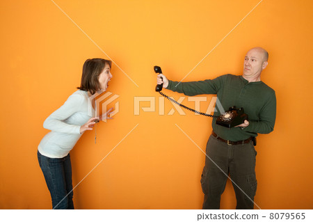 Angry Woman Yells At a Phone 8079565