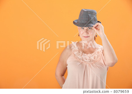 Woman Tips Her Hat 8079659