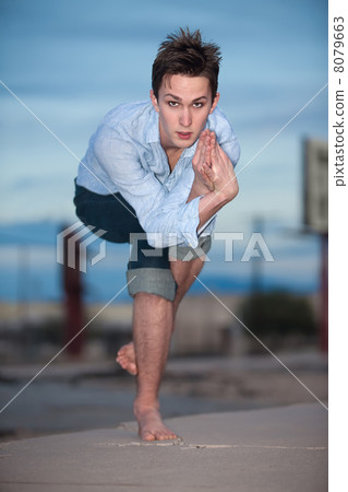 Young Man Exercising Young Man Exercising 8079663
