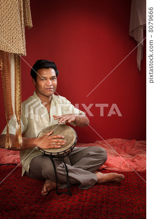 Indian Man Plays a Tabla Indian Man Plays a Tabla 8079666
